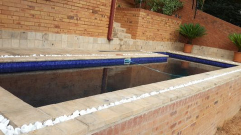 Swimming pool pebbles paving