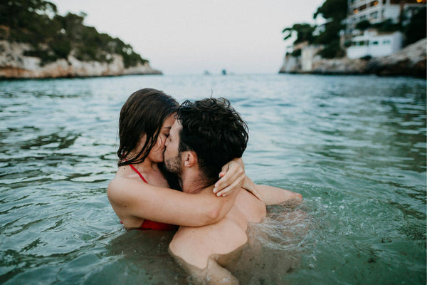 Couples enjoying in the swimming pool