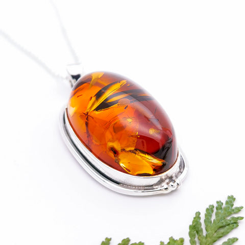 Simple Sterling Silver and natural oval Baltic amber in statement large pendant necklace