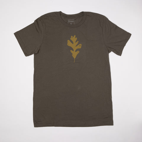 Green tee shirt with a golden brown oak leaf screen sprint on the front center chest