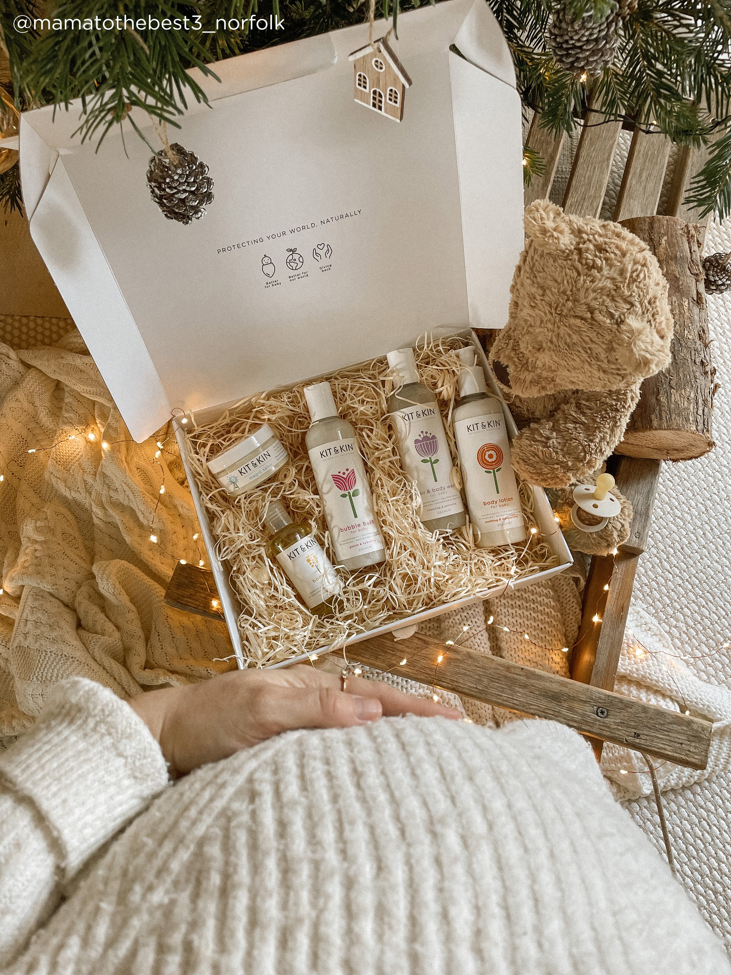 Skincare baby bundle in gift box on wood shavings