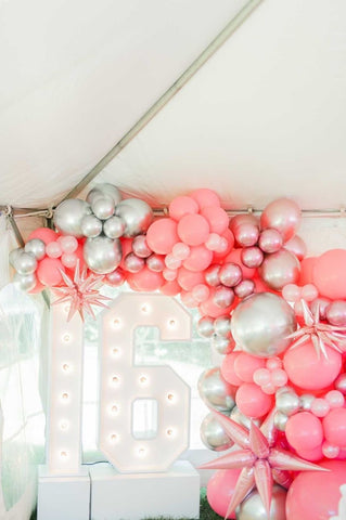 balloon garland for sweet 16 with marquee letters