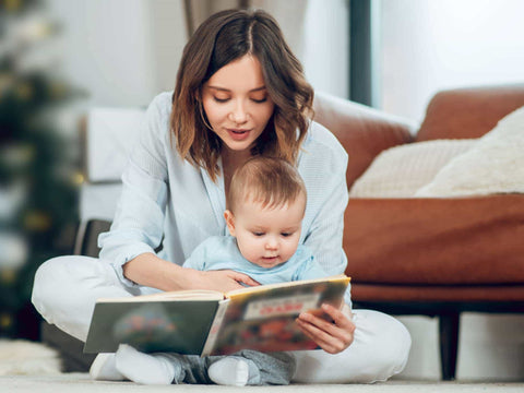 Mom reading to baby