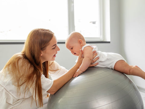 tummy time on yoga ball