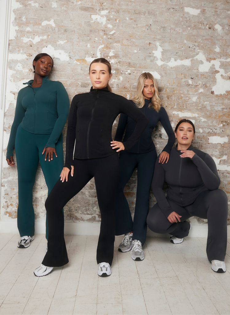 Dani Dyer and three models style and pose in the 4 colours of the Empower Flared Leggings Set by LOVALL.