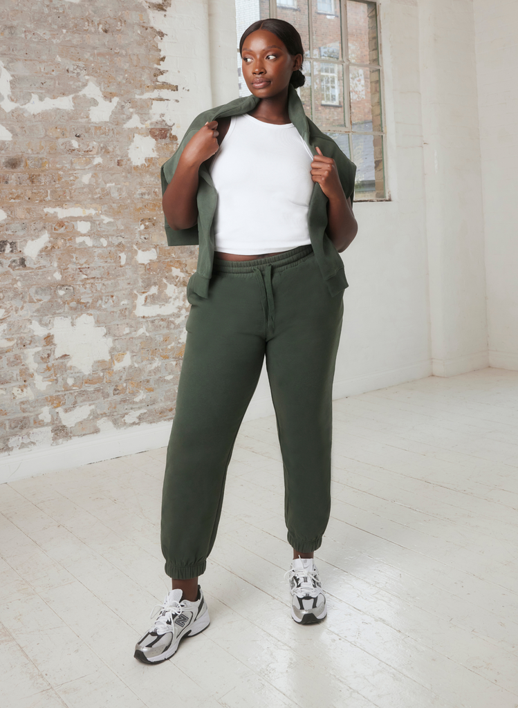 Model wears Everyday Jogger Set in Forest Green, by LOVALL.