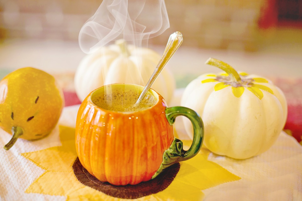 pumpkin shaped mug full of coffee