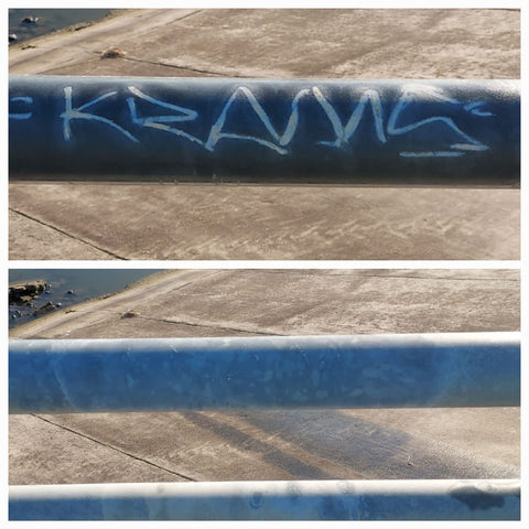 Graffiti removal off of sidewalk