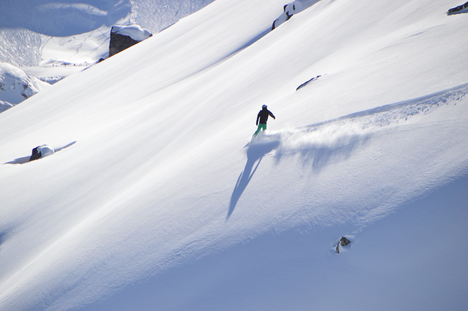 Skiing a powder line at Jackson Hole, WY.