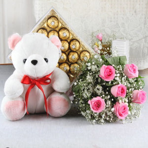 flowers chocolate and teddy bear