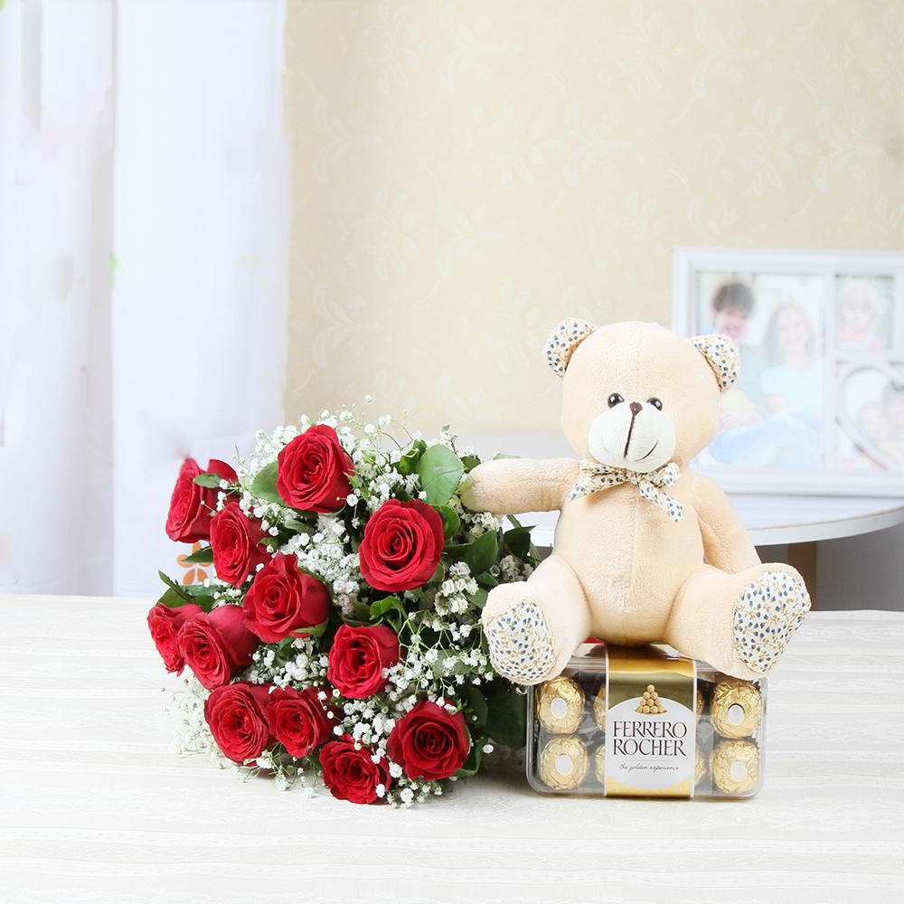 teddy bear with flowers and chocolate