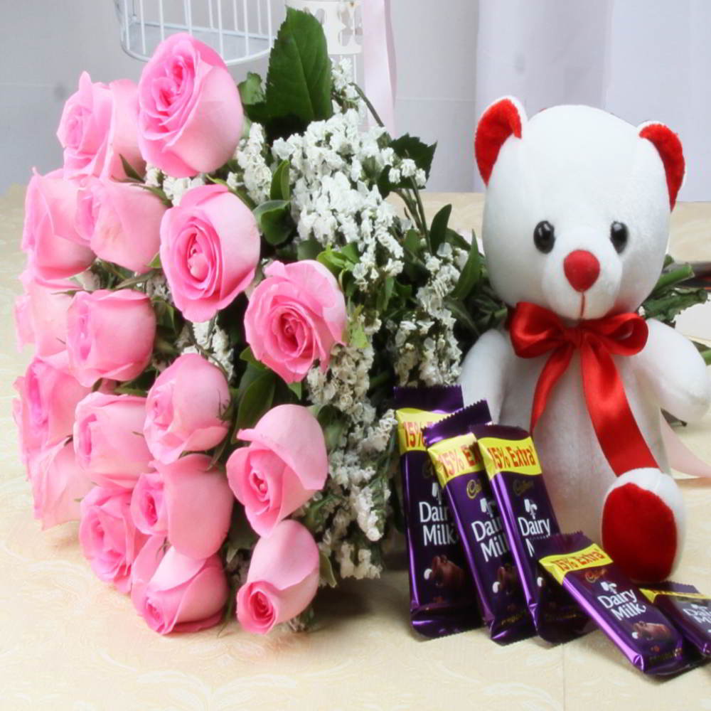 pink roses with teddy bear