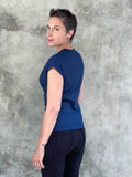 caraucci plant-based rayon stretch jersey navy blue cross over neckline top #color_navy