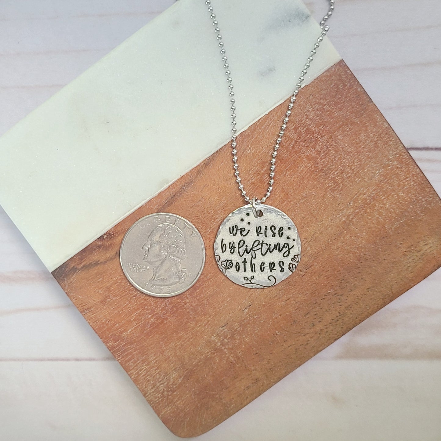 We Rise By Lifting Others Round Necklace