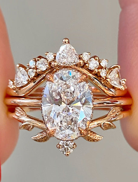 Oval Diamond Engagement Ring Stack with Crown and Leaf Bands | Ken & Dana