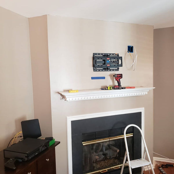 tv mount above fireplace