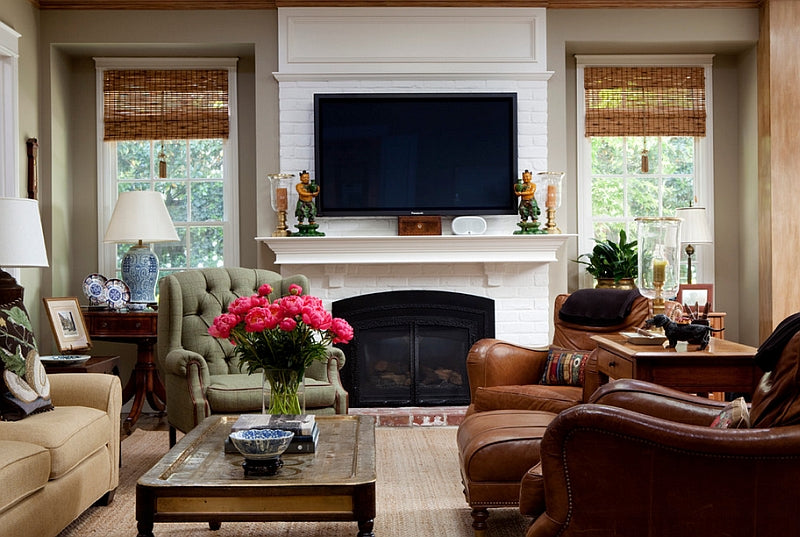 TV wall mount installation with wire concealment over fireplace