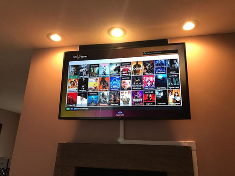 tv mount above fireplace