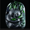 The image shows a dark green or emerald jade.