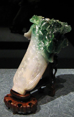 Cabbage is phonographic to best wealth in Chinese. Very good omen to business people. The image is of the famous Jadeite Cabbage, one of Taiwan’s cultural treasures.