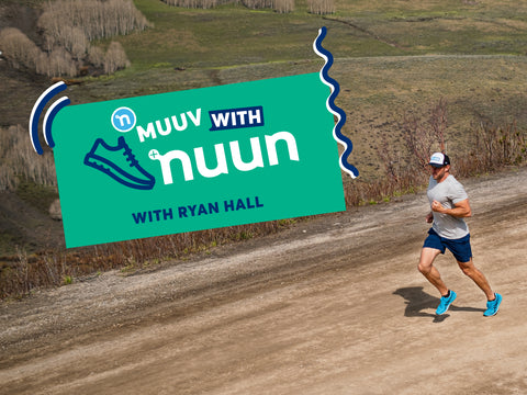 Ryan Hall is running on a flat dirt road 