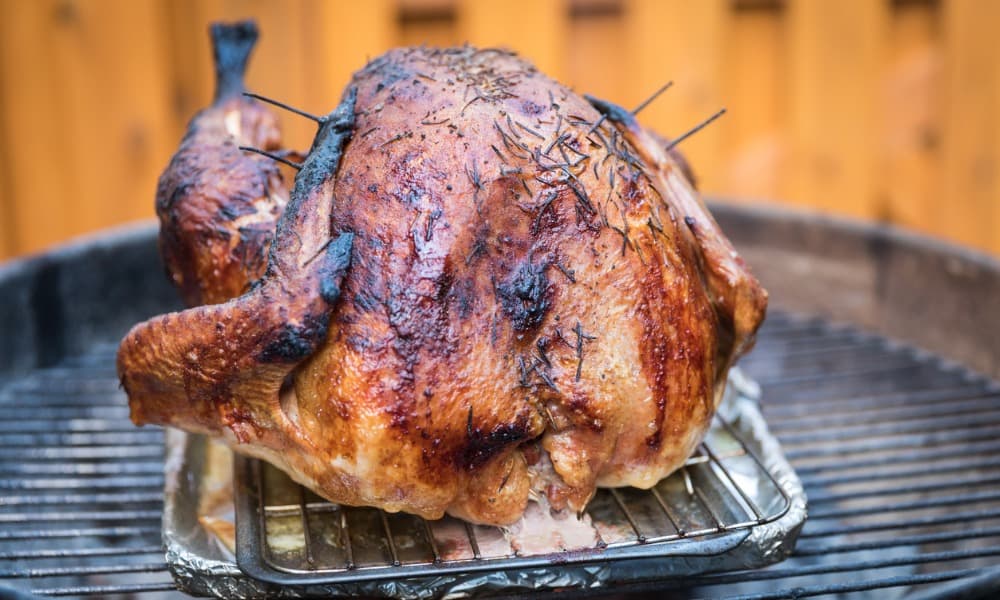 Smoked Turkey on a round Primo BBQ Grill