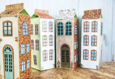 cardboard cartons as houses for small world play 