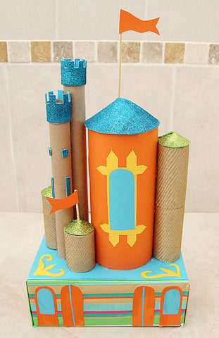 colourful cardboard castle made using tubes and boxes