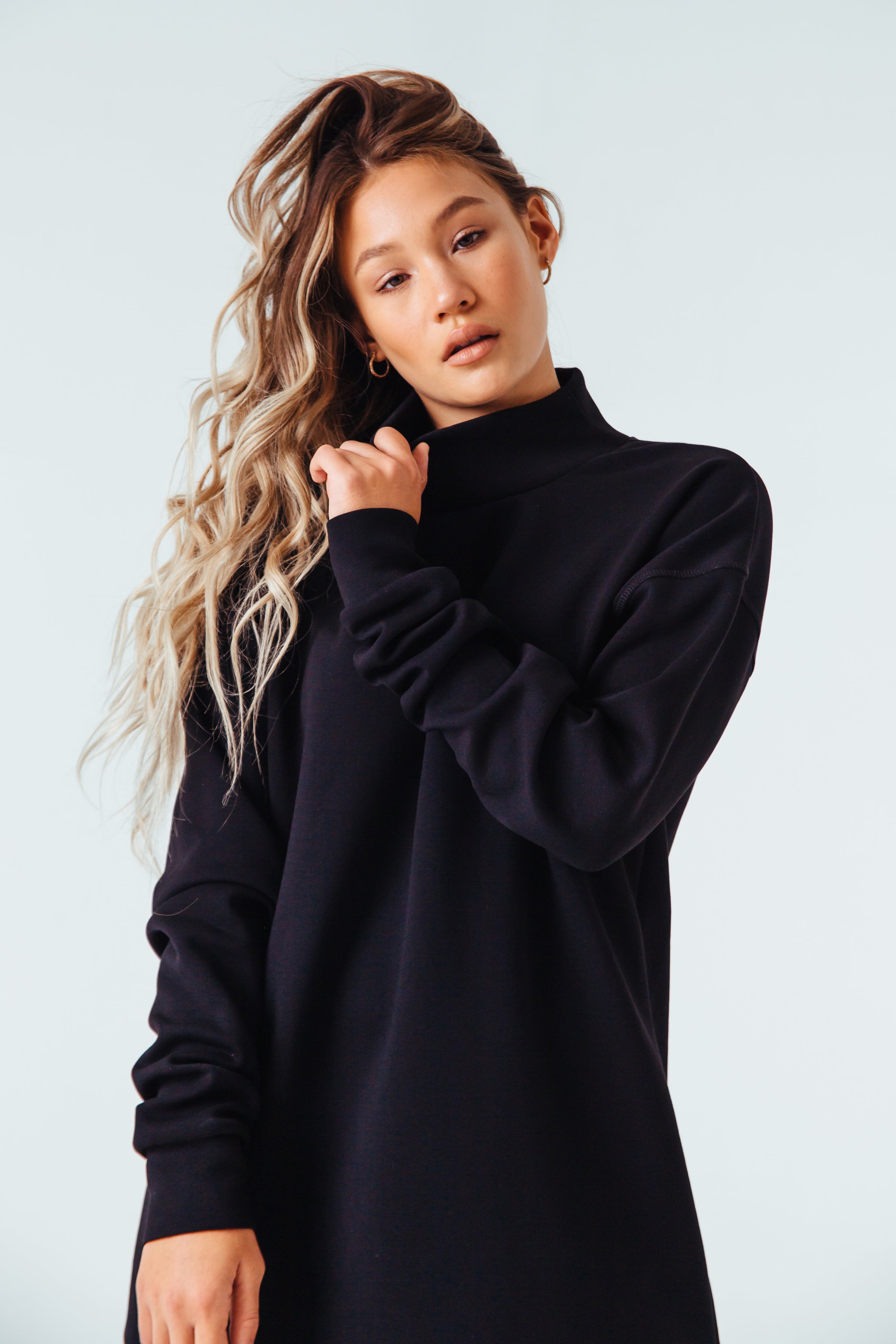 black mock neck sweatshirt