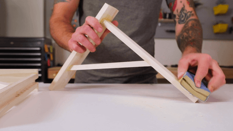 A man joining the brackets with glue