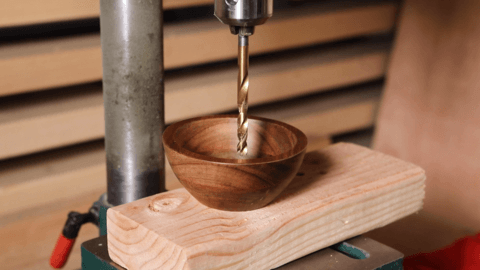 drilling into a wooden bowl