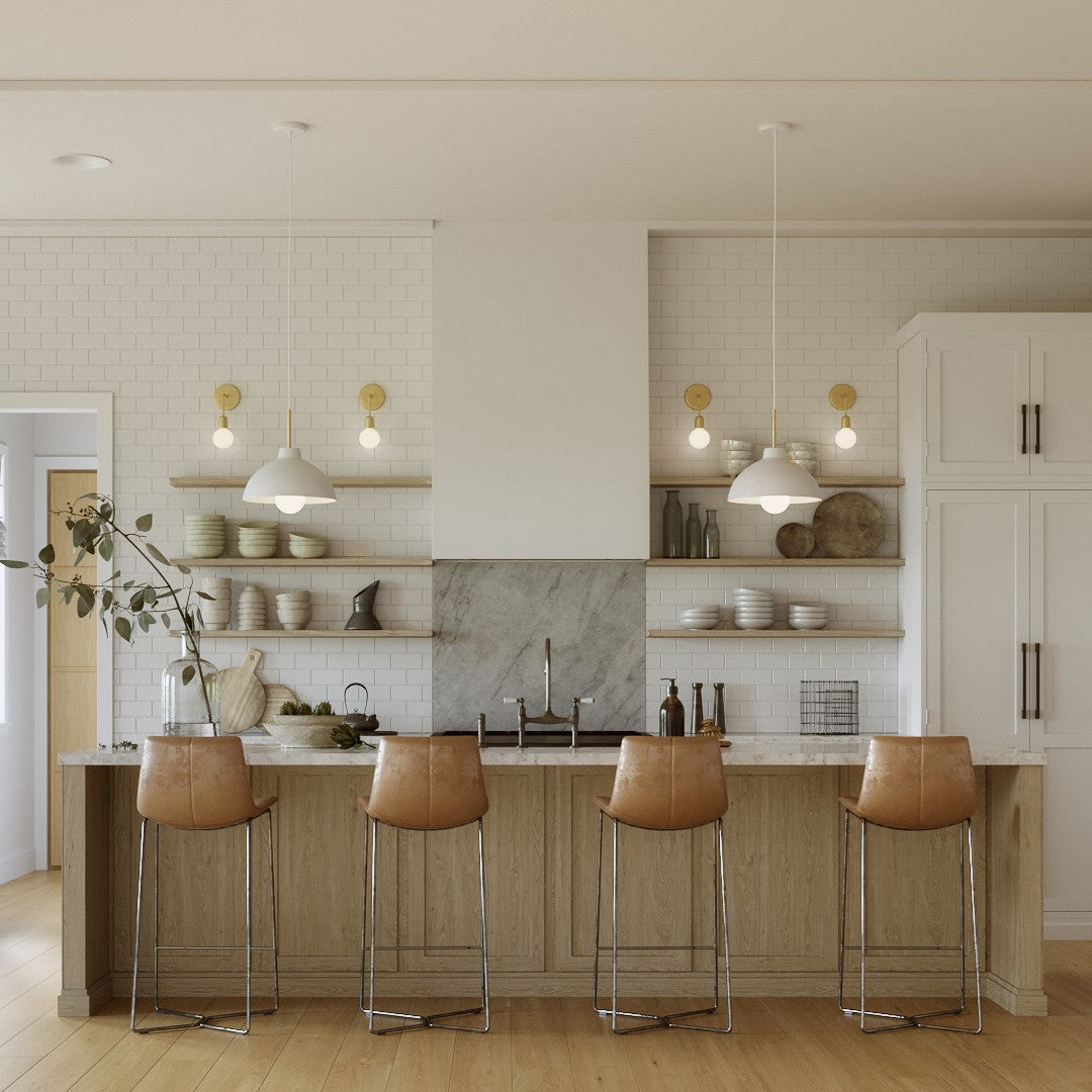 Color Cord pendant lights over a kitchen island in an open kitchen layout