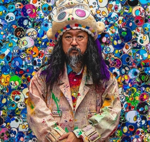 Takashi Murakami photo with graphic artwork.