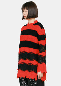 red and black striped sweater