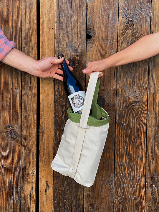 Sharing two bottles of Martha Stoumen wines in an Aplat Vin Tote