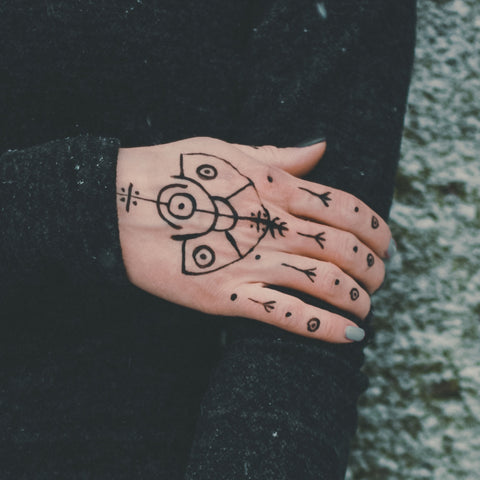 Jagua Tribal Design on a Woman’s Hand Image