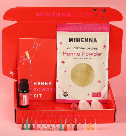The henna powder kit with a pack of henna powder, essential oils, applicator bottles & other tattoo supplies.