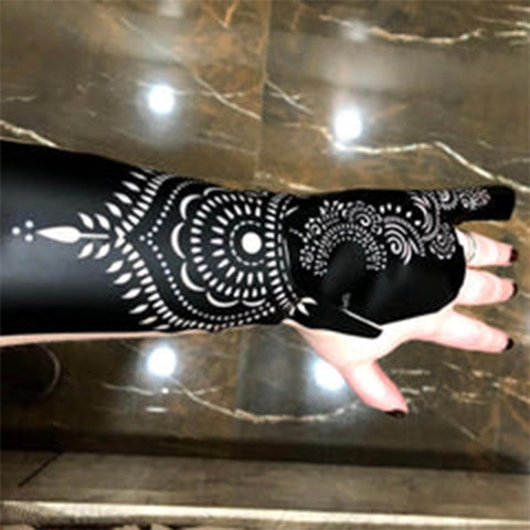 Two henna stencils into one henna tattoo