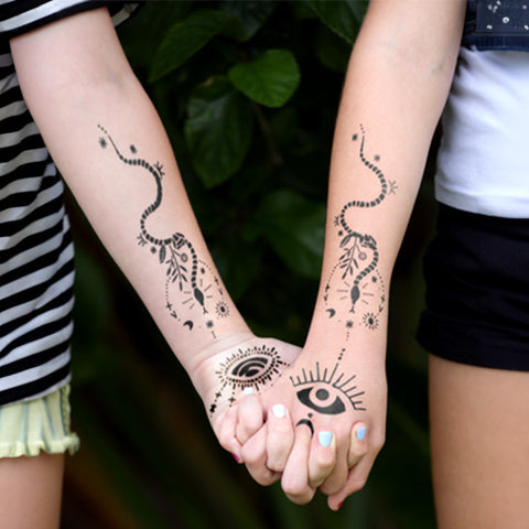 Holding hands adorning the combination of starry eyes & Sabrina designs.