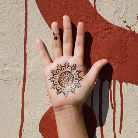 An image showcasing the Haley tattoo design on the right-hand palm.