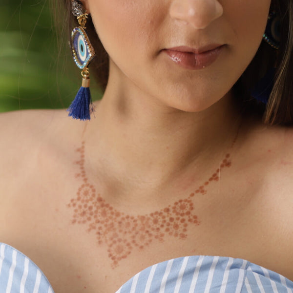 Henna jewelry - necklace design on chest