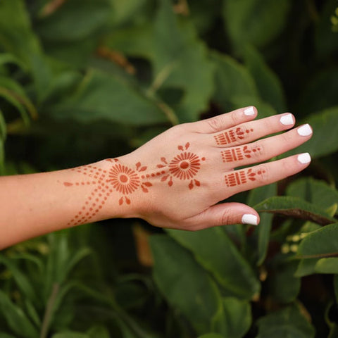 Hand with henna jewelry
