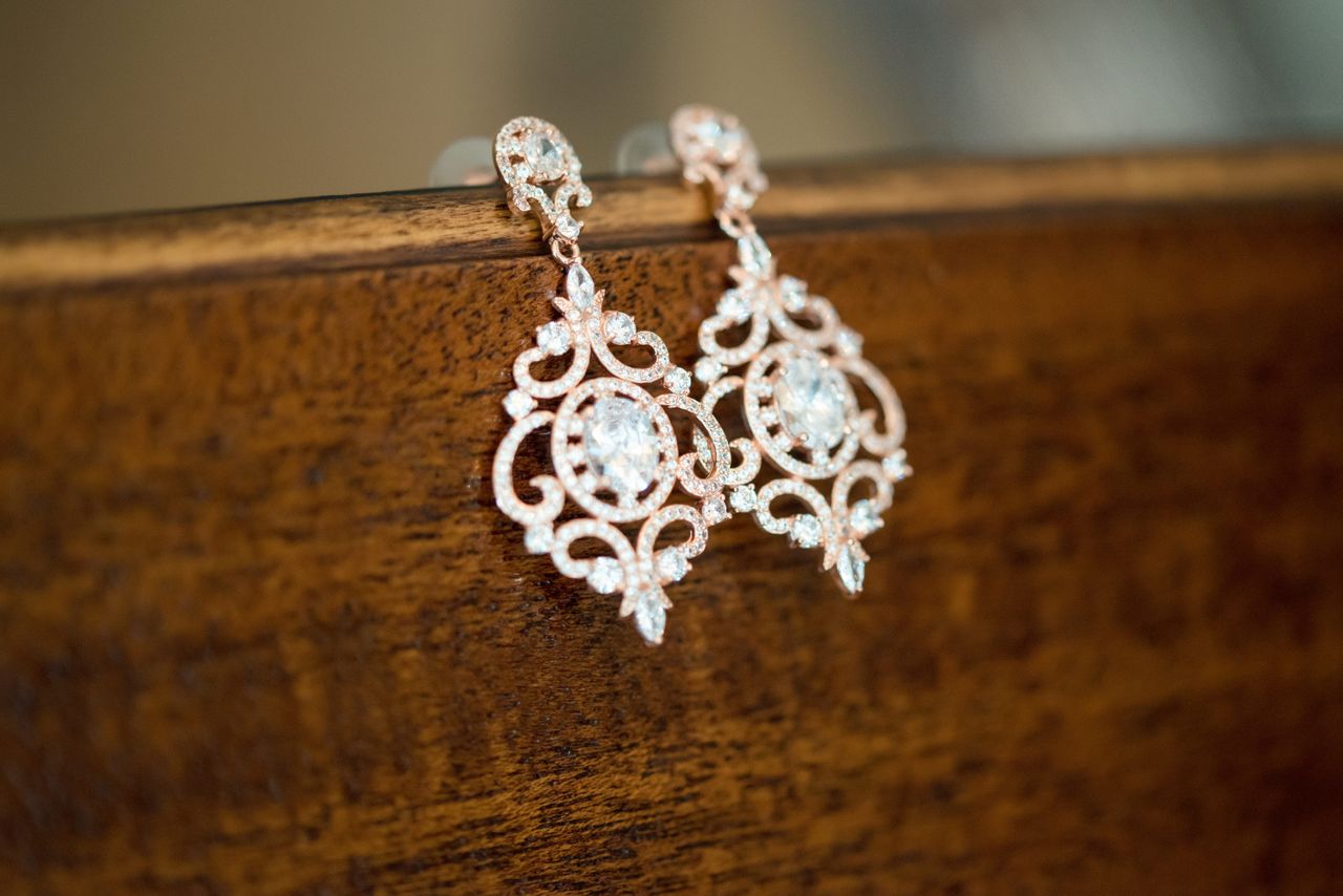 Pair of elegant vintage-style earrings with gold and diamonds