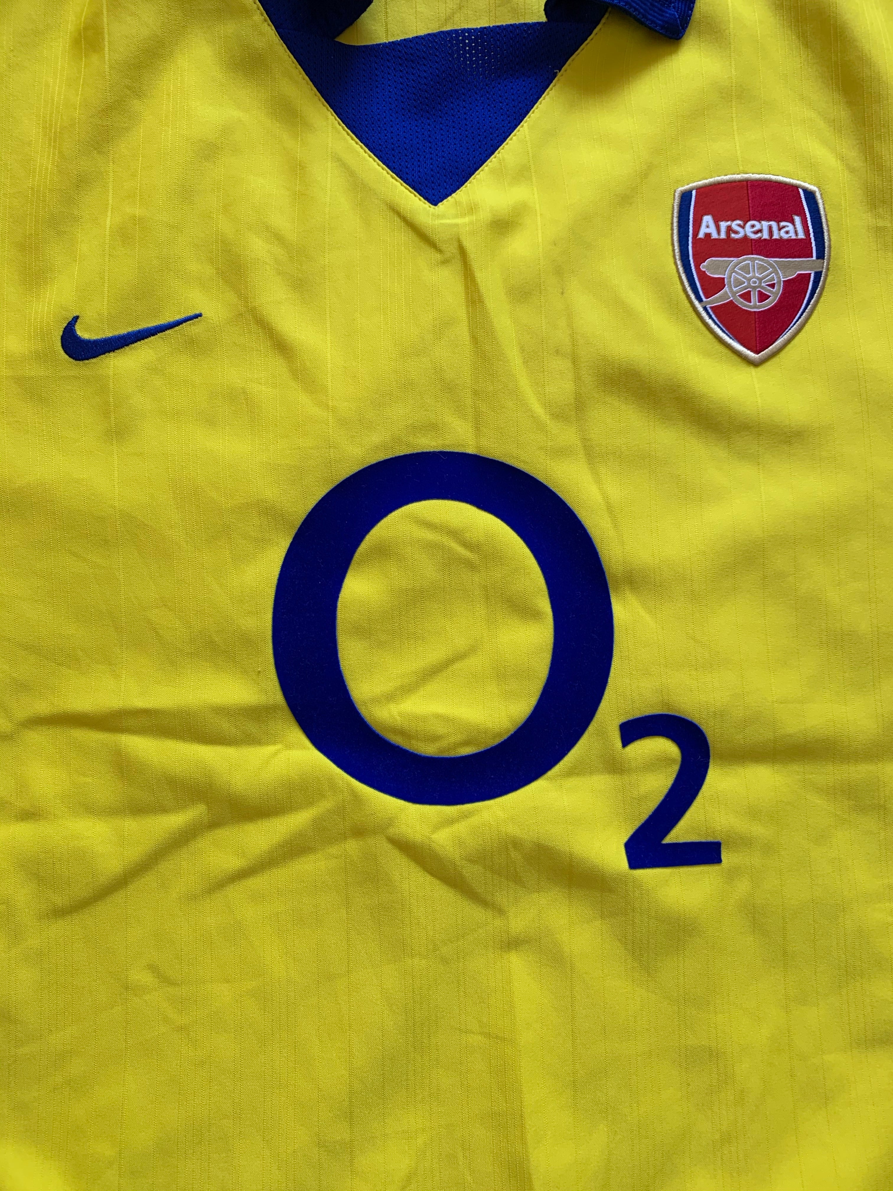 arsenal blue o2 shirt