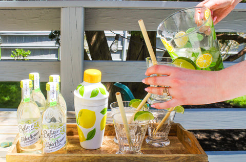 Pouring Mojito in glass