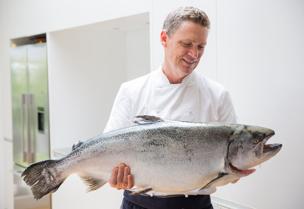 New Zealand chef Geoff Scott gets his hands on one of King Salmon’s supersize Tyee.Source: Ora King