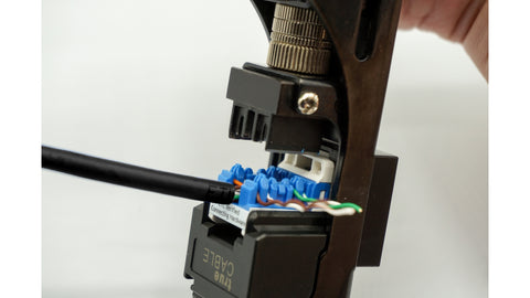 The EZ termination tool makes this simple. Place the pre-threaded jack in the tool, and operate the handle. All conductors should be seated and cut in one operation.