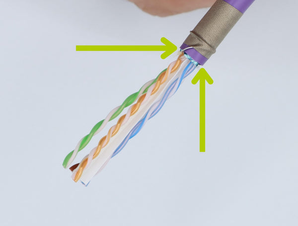 Check the conductors at the jacket edge for nicks.  Nicks show up as slices in the conductor insulation or even bright copper.  If you see nicks, start over.  Note:  Copper Fabric Strip shown already applied in this photo.