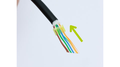 Place the conductors in the correct sequence.  T568B is shown.  Slide the load bar down the conductors to hold them in place.  Note the position of the load bar as it is position sensitive.