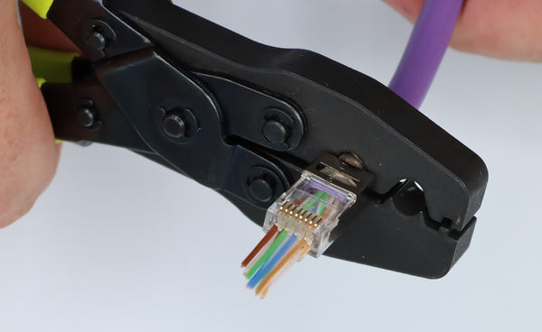 Place the assembly into the trueGROUND tool and use the large crimp cavity to fully compress the ground tab